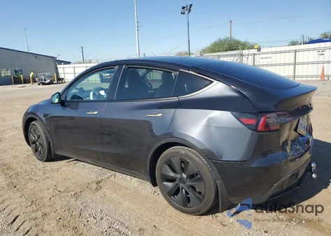 2025 Tesla Model Y from USA, damaged, VIN 7SAYGDED0SF249701